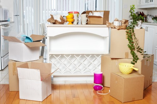 Removal van and movers handling an urgent move in Earls Court