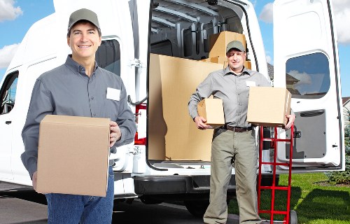 Furniture and boxes loaded into a van for Earls Court transport