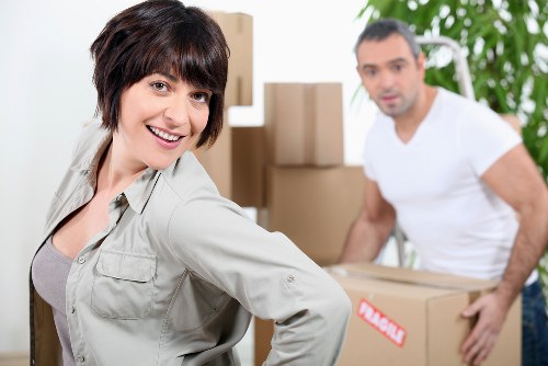 Local removal team loading household items for a short-notice move