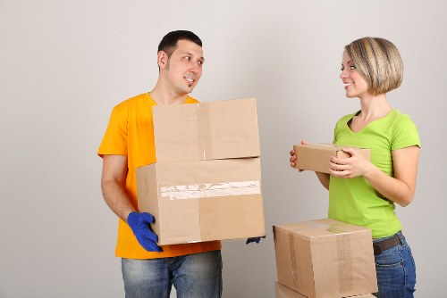 Furniture and boxes being prepared for a residential move in Earls Court