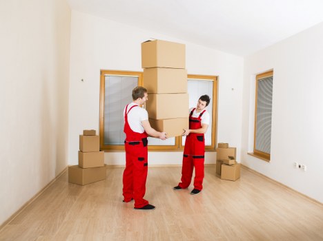 Household and office items prepared for transport in a van